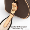 leather-metal-color-matching-gold-hardware-speedy-bag-strap Gold hardware and leather color matching Speedy handbag, premium metal clasp, vegetable tanned leather detail, decorative canvas shoulder strap connection.