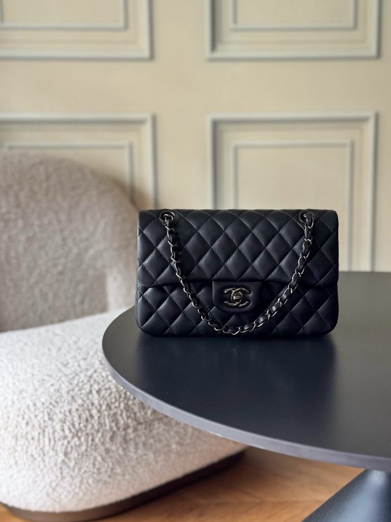 Chanel Classic 11.12 quilted handbag with chain strap and signature turn-lock closure