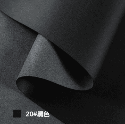 Close-up of microfiber synthetic leather showing a fine, dense grain-like texture