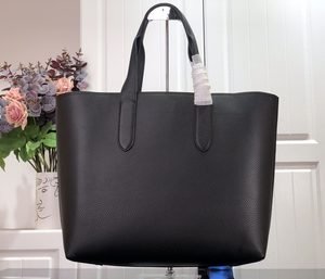 Structured full-grain cowhide leather tote bag with natural grain and sturdy handles