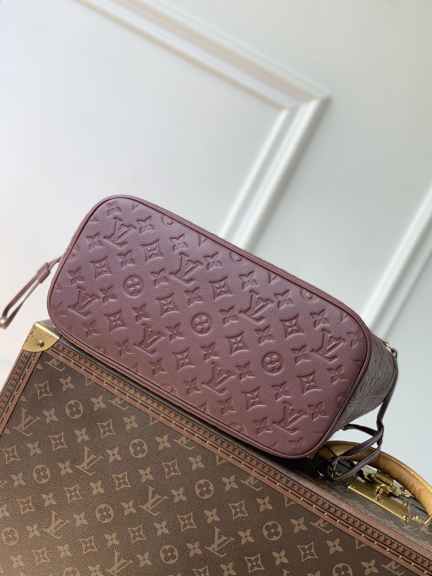 LV Neverfull MM Empreinte burgundy designer tote bag bottom view, embossed monogram leather